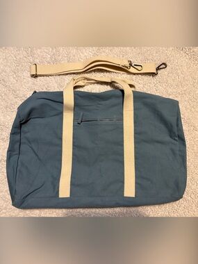 Known supply Canvas Duffel Bag in dusty blue with Cream Straps